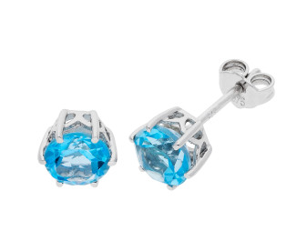 9ct White Gold Blue Topaz Solitaire Stud Earrings